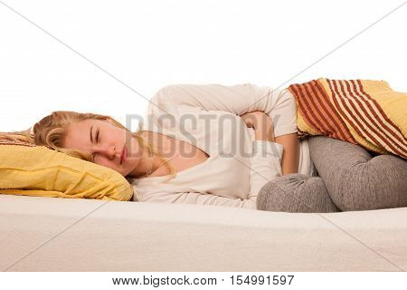 Woman Lying In Bed Holding Belly Because Of The Pain In Stomac.