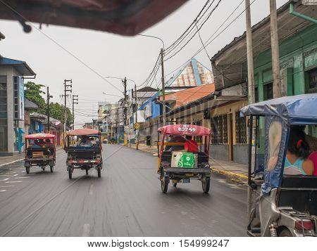 Rickshaws On A  Street