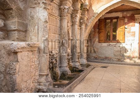 Venetian Building Somewhere In Crete Island, Rethymno, Greece