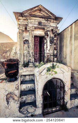 Christian Cemetery, Grave Inside Small Building. Tomb For The Dead. Monumental Cemetery Of Bonifacio