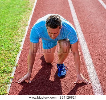 Runner Athlete Concentrated Low Start Position. Runner Take Part Competitions Low Start Position. Fo