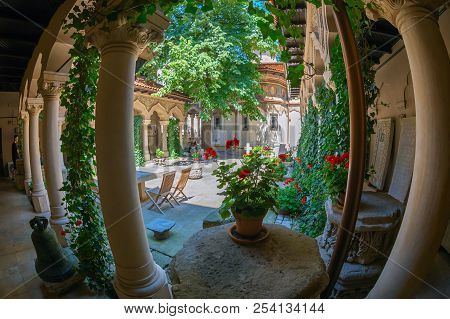 Bucharest, Romania - July 16, 2018: The Inner Courtyard Of Stavropoleos Monastery, Founded In 1724 B