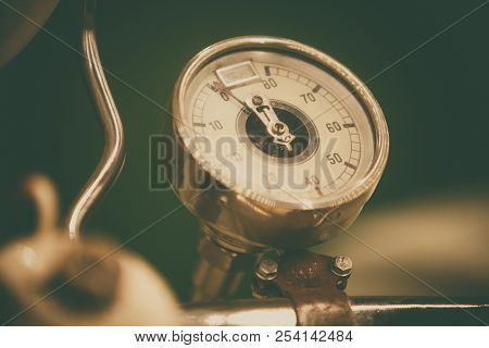 Close Up Shot With The Speedometer Of A Vintage Motorcycle.