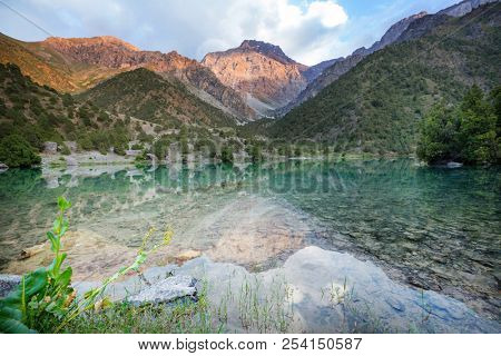 Beautiful serene lake in  Fann mountains (branch of Pamir) in Tajikistan.