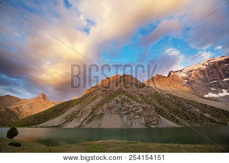 Beautiful serene lake in  Fann mountains (branch of Pamir) in Tajikistan.