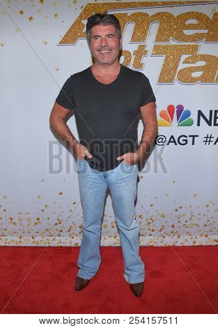 LOS ANGELES - AUG 14:  Simon Cowell arrives to the'America's Got Talent' Live Show Screening and Red Carpet  on August 14, 2018 in Hollywood, CA                