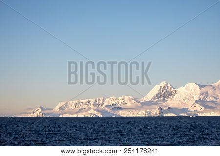 Ice In The Antarctica With Iceberg In The Ocean