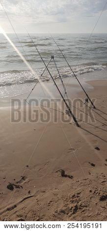 Fishing Rods In The Baltic Sea Beach