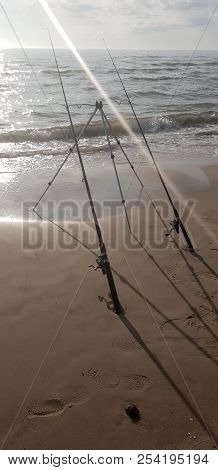 Fishing Rods In The Baltic Sea Beach