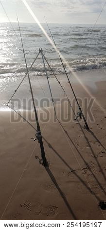 Fishing Rods In The Baltic Sea Beach