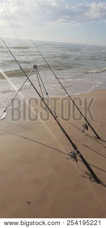 Fishing Rods In The Baltic Sea Beach