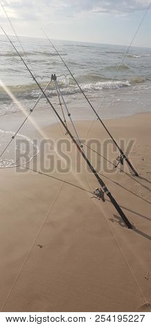 Fishing Rods In The Baltic Sea Beach