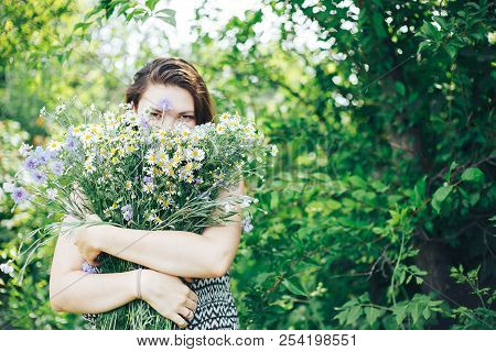 Young Beautiful Woman Girl Hold Big Bouquet Of Wild Field Flowers