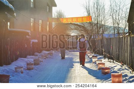 Harbin, China - Feb 21, 2018. People Walking On Street At Winter In Harbin, China. Harbin Is The Cap