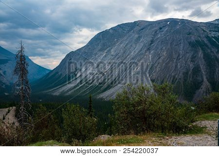 A Dark Mount Cirrus Under Cloudy Skies. Dominates The Landscape.