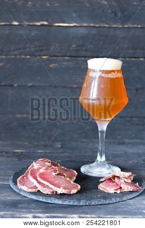 A Glass Of Light Beer. Beer With Chopped Meat.