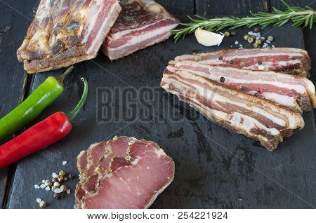 Cutting Dried Meat. Sliced Jerky. Meat Snack.