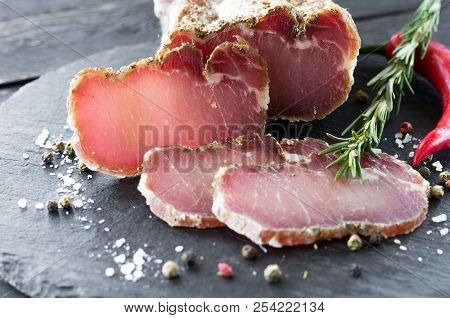 Dried Meats With Spices And Rosemary. Spicy Meat.