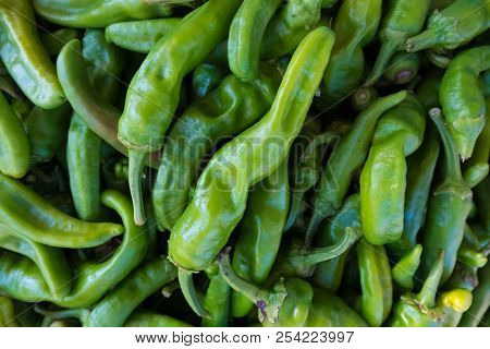 Fresh Green Pepperoni Vegetables At A Street Organic Food Market.
