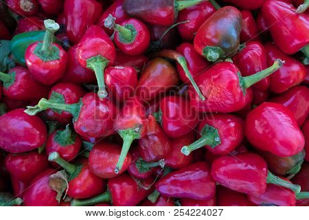 Fresh Red Bell Pepperoni Vegetables At A Street Organic Food Market.