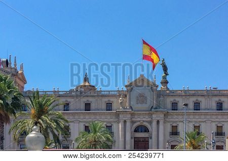 Flag Of Spain On The Roof Of The Building, Touching The Flag