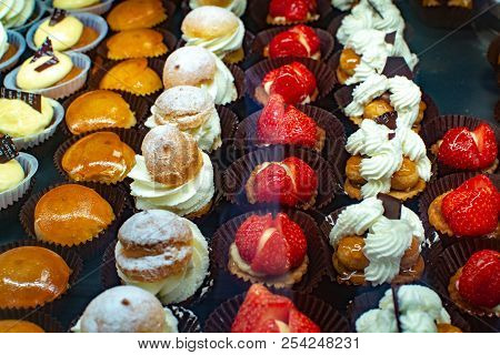 Variety Of Fresh Baked Homemade Cakes In Small French Bakery In Provence Close Up