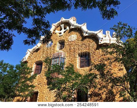 Fairytale House, Picturesque House Among The Trees In The Park, Clear Skies And Warm Sunny Weather