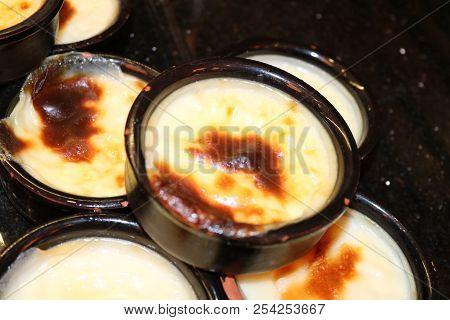 Turkish Rice Pudding Sutlac Served In A Crock. Turkish Dessert.