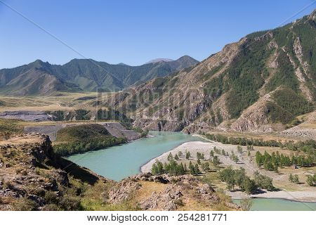 Katun River In Gorny Altai, Russia, Surrounded By High Mountains