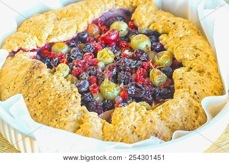 Summer Crostata Or Galette Pie With Fresh Garden Berries