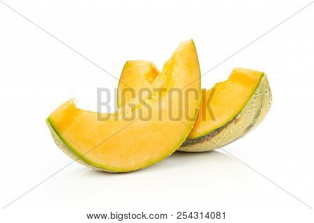 Group Of Two Slices Of Fresh Melon Cantaloupe Variety Without Seeds Isolated On White Background