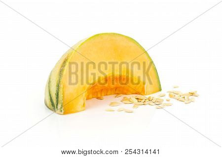 One Slice Of Fresh Melon Cantaloupe Variety With Seeds Around Isolated On White Background