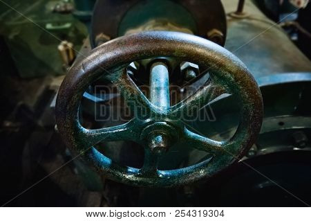 Old Metallic Shiny Valve Wheel. Close Up.