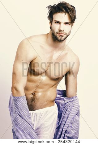 Sexy Macho With Muscular Body In Home Or Bath Clothes. Morning Concept. Man With Beard In Blue Dress