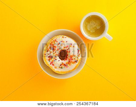Donut Breakfast Food And Espresso Coffee On Yellow Background