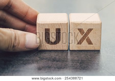 Ux Development, User Experience Design Concept, Hand Building Cube Wooden Block With Alphabet U And 
