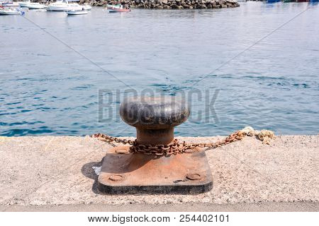 Photo Picture Of A Rusty Metal Mooring Bolard For Big Ship