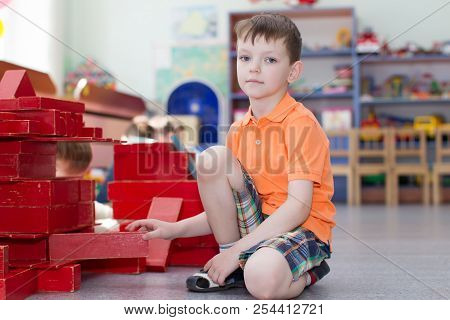 Belarus, Gomel, May 29, 2018. The Kindergarten Is Central. Open Day.the Boy Plays The Designer. The 