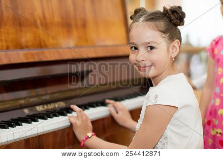 Belarus, Gomel, May 29, 2018. The Kindergarten Is Central. Open Day.child Plays The Piano.preschool 