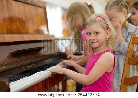 Belarus, Gomel, May 29, 2018. The Kindergarten Is Central. Open Day.child Plays The Piano.preschool 