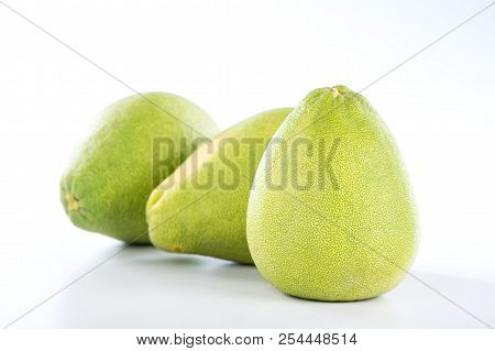 Fresh And Peeled Pomelo(shaddock), Grapefruit With Slices Isolated On White Background