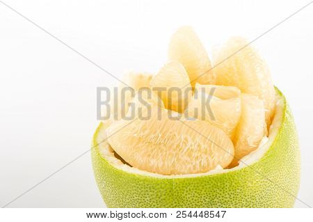 Fresh And Peeled Pomelo(shaddock), Grapefruit With Slices Isolated On White Background