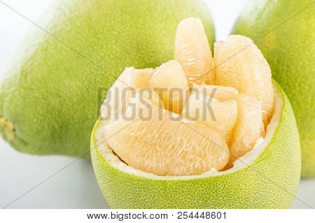 Fresh And Peeled Pomelo(shaddock), Grapefruit With Slices Isolated On White Background