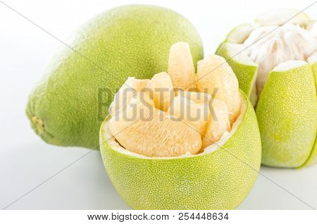 Fresh And Peeled Pomelo(shaddock), Grapefruit With Slices Isolated On White Background