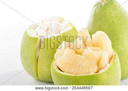 Fresh And Peeled Pomelo(shaddock), Grapefruit With Slices Isolated On White Background