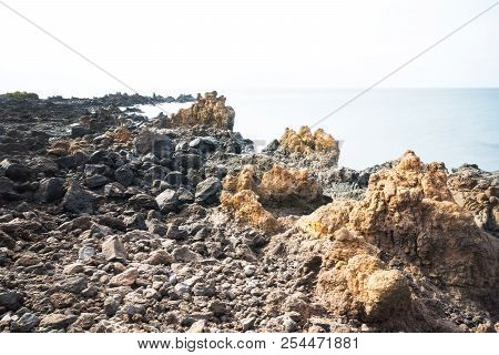 Non Classical View Of The Coast Of Lanzarote Formed Mostly By Cooled Lava During A Sunny Day. Here W