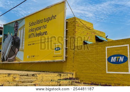 Kigali,rwanda - October 16,2017: Remera On The Wall Is A Yellow Advertisement Of The Telecommunicati