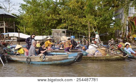 Phong Dien, Vietnam - December 31st 2017. Tourist On A Boat Tour At The Phong Dien Floating Market N