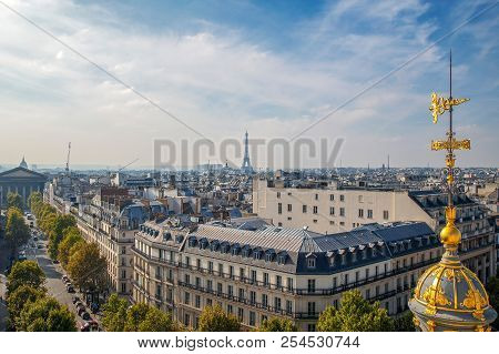 Colors Between Seasons In Paris, France. Aerial View With Madeleine Church, Eiffel Tower And Symbol 