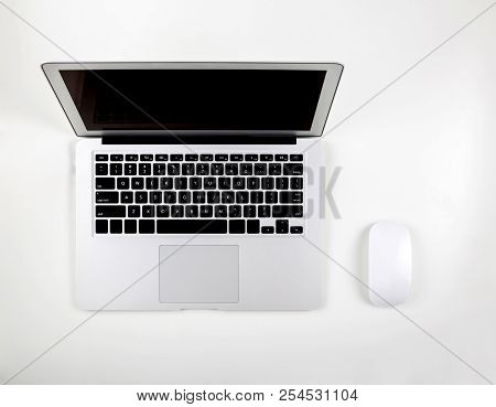 Top View Of Laptop Computer With Open Display Screen Monitor And Mouse Isolated On White Background,
